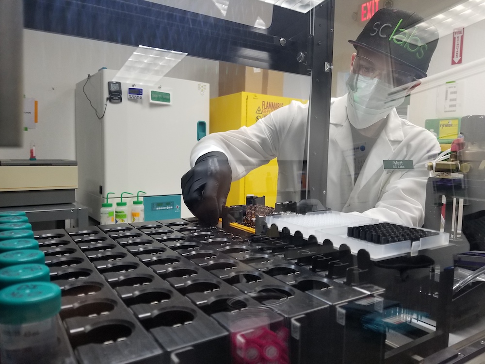 Scientist working with test tubes in the lab